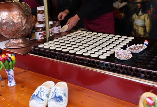 Gouda, the Nehterlands - April 20, 2023: Freshly baked cookies at a street stall in Gouda. Nehterlands