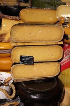 Gouda, the Nehterlands - April 20, 2023: Display of traditional Dutch cheese at local cheese shop in Gouda, the Netherlands