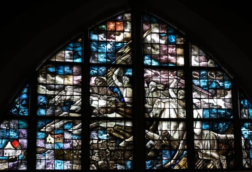 Gouda, the Nehterlands - April 20, 2023: The Stained glass number 28a The Liberation window 1947 by Charles Eyck in the Sint Janskerk