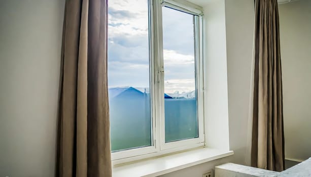 closed pvc window in room at apartment
