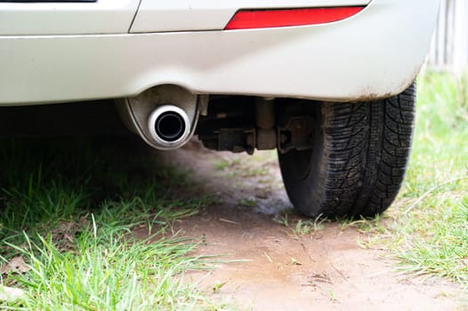 Exhaust of a car, CO2 emission, air pollution, global warming and climate change, reduce carbon footprint, environment protection, lifestyle