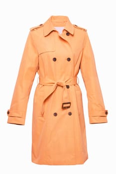 Woman coat isolated. A luxurious and stylish elegant female orange yellow  trenchcoat on mannequin isolated on a white background. Trench coat for spring and summer fashion.