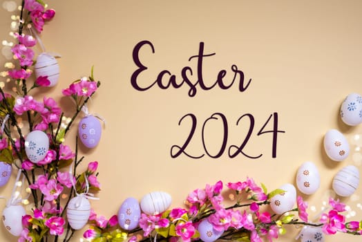 English Text Easter 2024 On Beige Background. Pink And Purple, Shiny And Bright Spring Flower Arrangement With Easter Egg Decoration.