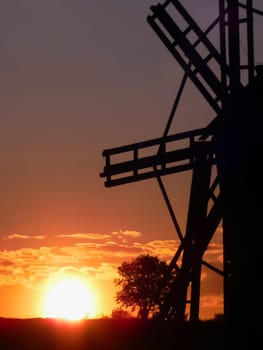 Windmill wooden mill against the sky Windmill wooden mill against the sky