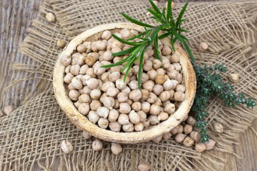 chickpeas in a basket and fresh herbs