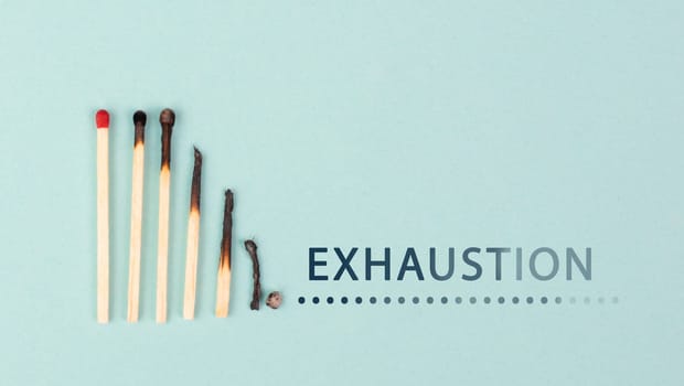 Exhaustion and stress, burnout in hustle culture, low energy, burning matches in a chain, domino effect, work life balance