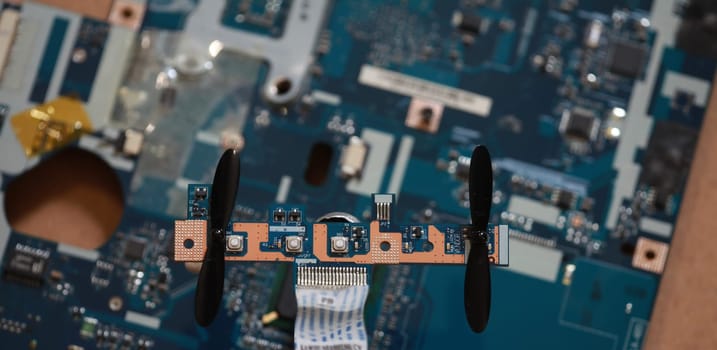 drone with two propellers on a computer board