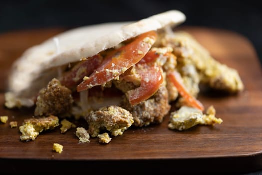 close up of greek falafel pita sandwich