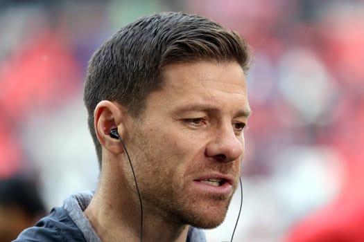 Coach Xabi Alonso (Bayer 04 Leverkusen) at the match of the 1. FBL: 23-24: 26. Sptg. SC Freiburg - Bayer 04 Leverkusen  DFL REGULATIONS PROHIBIT ANY USE OF PHOTOGRAPHS AS IMAGE SEQUENCES AND/OR QUASI-VIDEONann  Photo: Joachim Hahne/johapress