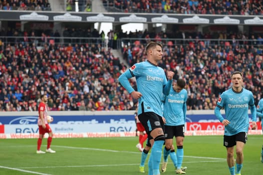 Adam Hložek (Bayer 04 Leverkusen) celebrates his goal to make it 2-1 at the break in the 1st FBL game: 23-24: 26. SC Freiburg - Bayer 04 Leverkusen  DFL REGULATIONS PROHIBIT ANY USE OF PHOTOGRAPHS AS IMAGE SEQUENCES AND/OR QUASI-VIDEONann  Photo: Joachim Hahne/johapress