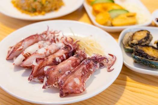 Chinese style seafood arranged dishes in restaurant