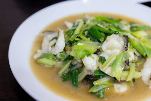 Slice of fish with vegetable soup