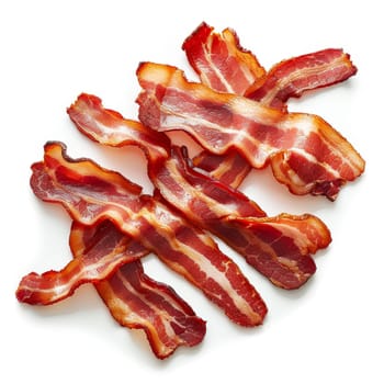 Several slices of cured bacon in a pile on a white background. The bacon slices are thin, translucent and pink with streaks of white marbling