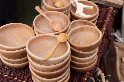 Cracow, Poland - April 11, 2023: Imitations of old wooden vessels in knight camp at the festival of historical reconstruction