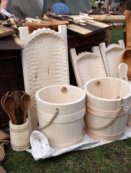 Cracow, Poland - April 11, 2023: Imitations of old wooden vessels in knight camp at the festival of historical reconstruction