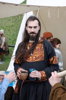 Krakow, Poland - April 11, 2023: Unidentified participants of Rekawka - Polish tradition, celebrated in Krakow on Tuesday after Easter. Currently has the character of festival historical reconstruction