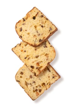 Experience the allure of three classic panettone slices, each embodying the timeless charm and irresistible flavor of this beloved Italian delicacy, elegantly arranged against a pristine white backdrop.