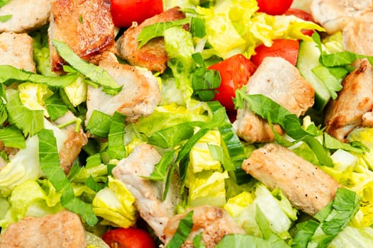 Fresh salad of fresh vegetables, herbs and fried meat. Dish. Roast. Lunch. Salad.