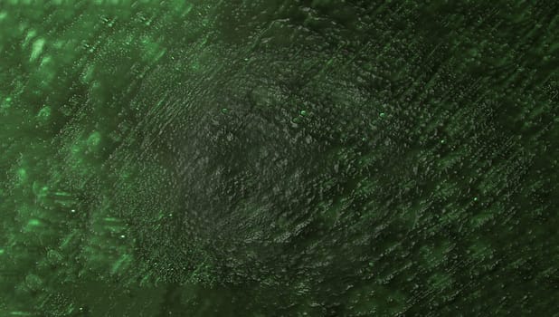 A rough ribbed old wall painted green