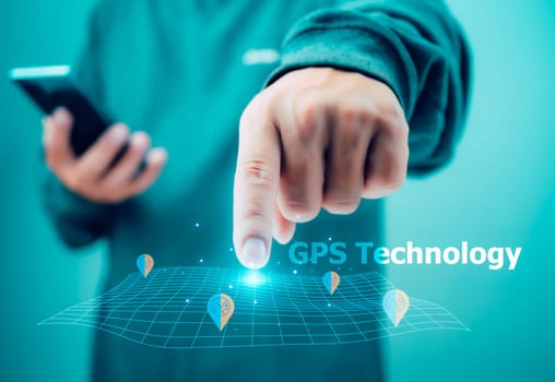 Man hand using smartphone with gps navigation map icon on light green background, Concept of online navigation and GPS, Destination travel maps and find places in the online system.