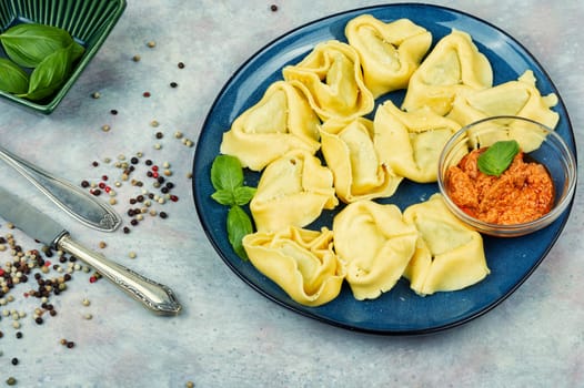 Tortelloni stuffed with ricotta cheese and basil pesto.