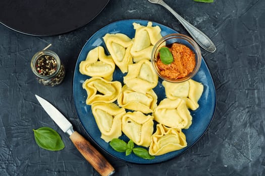 Tortelloni stuffed with ricotta cheese and basil pesto.