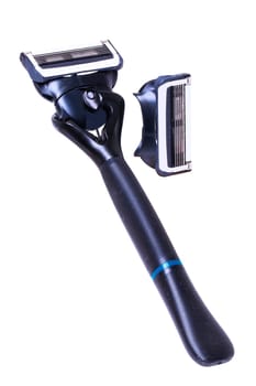 Mens razor isolated. Modern safety razor or shaving machine for mans with many blades.  Beard and hair care. Present for a man. Macro.