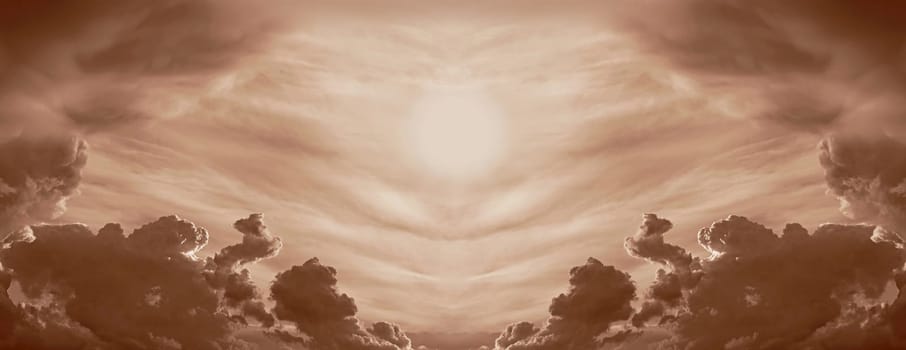 A beautiful mirrored cloudscape with sun in Peach Fuzz