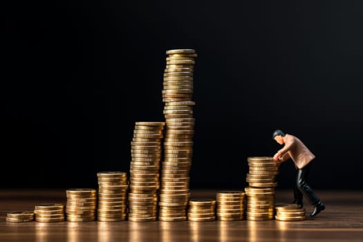A person making financial decisions with a stack of coins