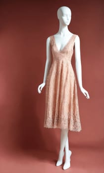 mini dress with low neckline on a mannequin. ai generative.