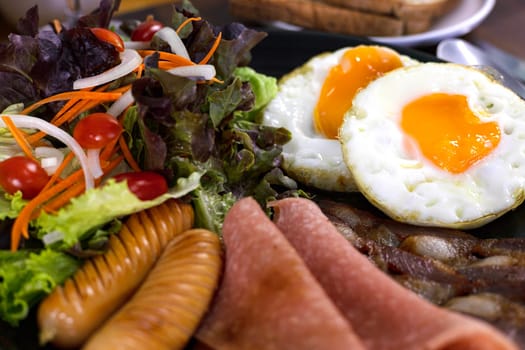 Healthy Breakfast With Fresh Organic Vegetable Salad Fried Egg And Sausages. Fresh food.