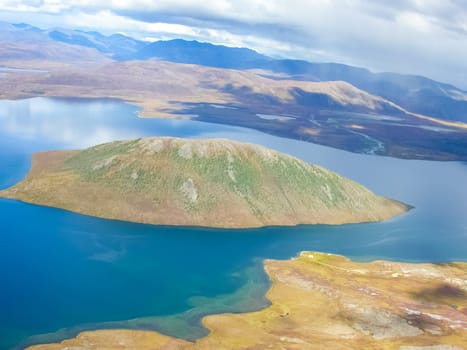 View of the nature and villages of Chukotka from the height of the helicopter.