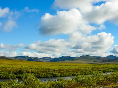 View of the nature and villages of Chukotka from the height of the helicopter.