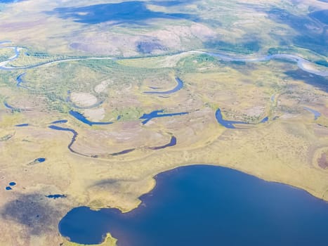 View of the nature and villages of Chukotka from the height of the helicopter.