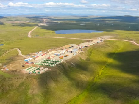 View of the nature and villages of Chukotka from the height of the helicopter.
