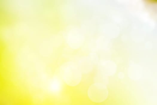 Abstract blurred fresh vivid spring summer light delicate pastel yellow white bokeh background texture with bright circular soft color lights. Beautiful backdrop illustration.