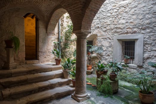 P. de Acim, Spain - Jan 21st, 2024: Old cloister of El Palancar Convent, Pedroso de Acim, Caceres, Spain