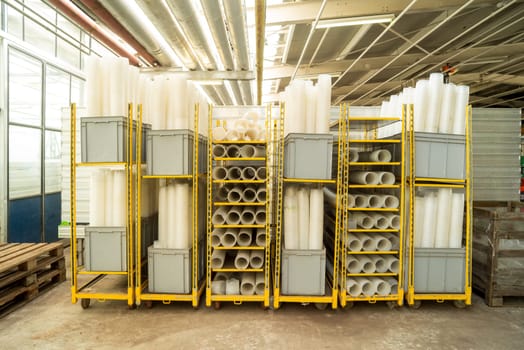 stockpile of trays in a commercial greenhouse