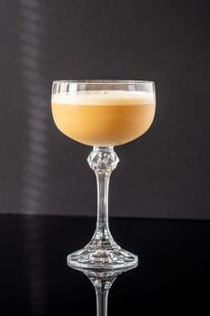 Death Flip cocktail garnished with grated nutmeg