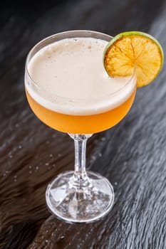 Hoyt's Daiquiri cocktail garnished with seared lime wheel