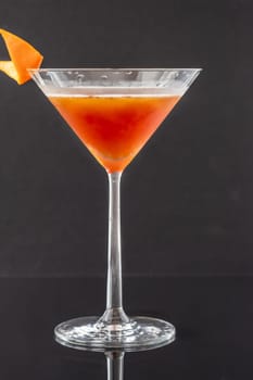 Elysee Treaty Cocktail garnished with orange zest