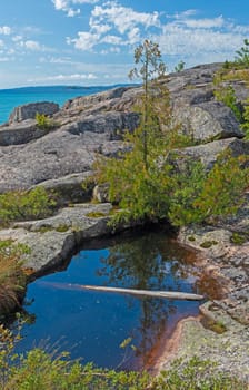 Tiny Pond on a Rocky Great Lakes Shore in Neys Provincial Park in Ontario