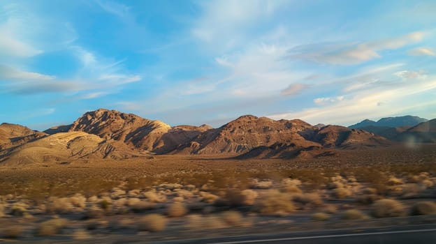 Embark on an unforgettable journey through the vast landscapes of the American Southwest, where desert highways weave through the heart of Nevada, California, and Arizona. This photo captures the essence of a wild vacation adventure by car, promising thrilling vistas and boundless opportunities for exploration.