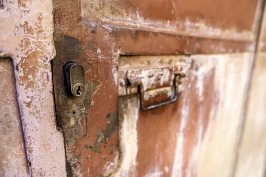 Detail of old lock outside, rust and abandonment