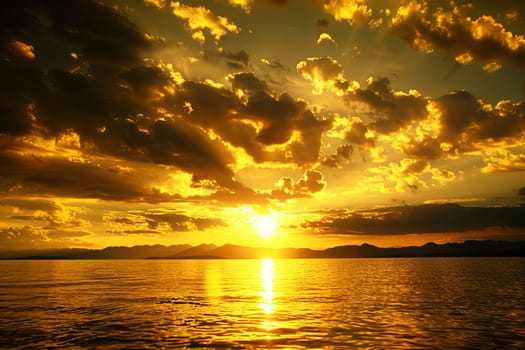 The sun is seen in the process of setting low in the sky, casting a warm orange glow over a large body of water. The sky is streaked with shades of pink, purple, and orange, reflecting off the calm water below.