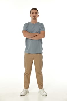 handsome young calm man on white background