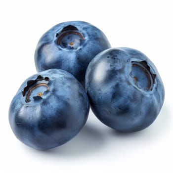 A close-up shot of a pile of blueberries stacked on top of each other, showcasing the vibrant colors and textures of the berries isolated on white background