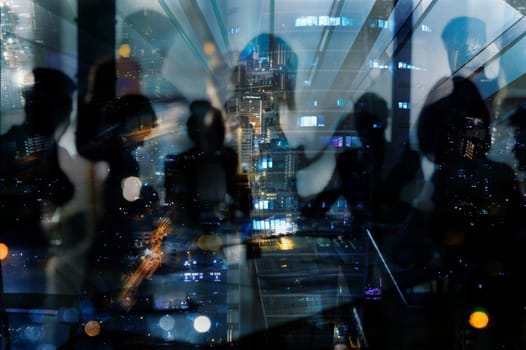 Double exposure of business people who work together in office