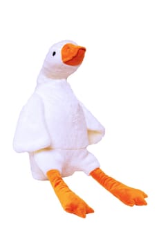 Plush toy duck isolated. Childrens toy stuffed animals. Soft white plush toy ente for kids isolated on a white background. Enter teddy toy. White duck for playing.