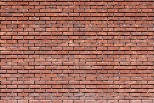 close up of a red brick wall - full-frame background and texture.